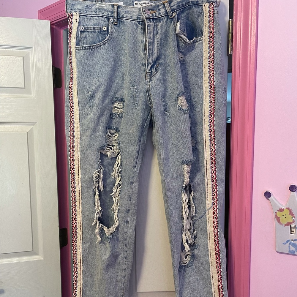 Pull and bear distress jeans with detailing on the side